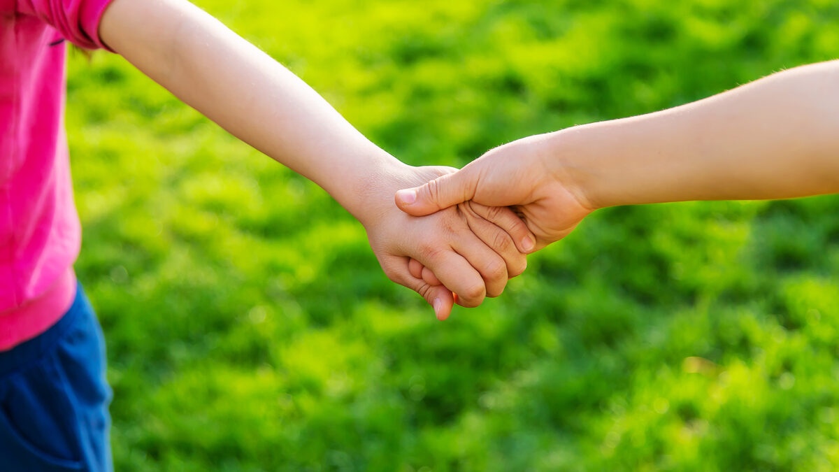 children-walk-together-holding-hands-selective-fo-2024-12-19-18-52-17-utcneu.jpeg